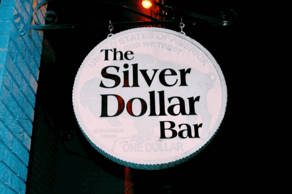 Picture of the Silver Dollar sign outside the Silver Dollar Bar in Athens.